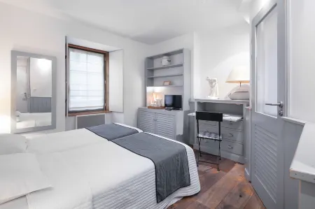 La Vinotière Chambres Appartements Spa Отели в г. Порсподе