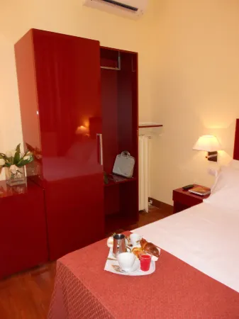 Hotel Minerva Отели рядом с достопримечательностью «Сан Винченцо ин Прато»