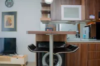 Spacious 2Br at Royal Olive Apartment Hotel dekat Trans Studio Cibubur