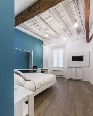 Rumi Rooms Hotéis em Como City Center