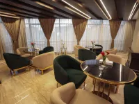Cairo Taj Mohandessn Hotels & Suites Отели рядом с достопримечательностью «Докки»