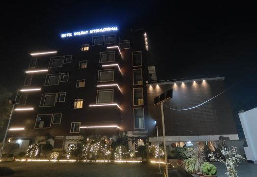 Hotel Holiday International - Housity