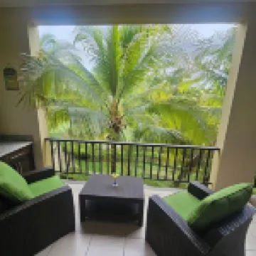Spacious Pacifico condo-large balcony.  Access to pool, jacuzzi with bar/grill