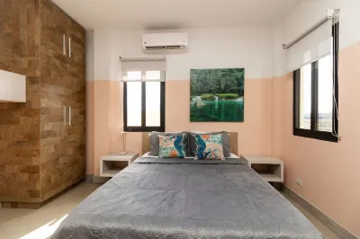 Gold Standard | Tropic Suite Hôtels à : 