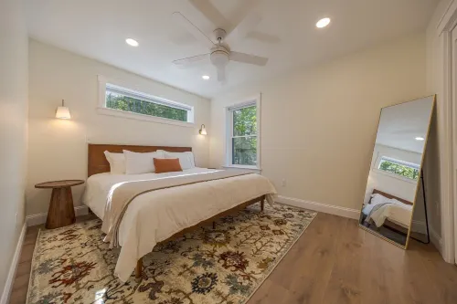 Charming 2-bedroom apartment nestled in a quiet neighborhood with nearby stream.