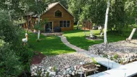 Spacious Summer Escape: Private Backyard, Dock & Fire Pit, Channel Waterfront