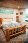 Modern mountain- inspired monoslope home located in the beautiful Northwoods