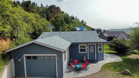 Discover the charm of Palmer Lake at this cozy cottage in this peaceful town.