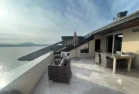 Spacious apartment in Stresa with panoramic views and a terrace by the water