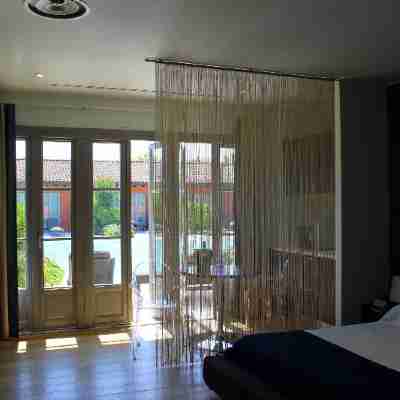 Joia Hotel & Luxury Apartments Rooms