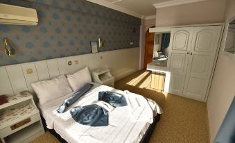 Kozan Hotel - Housity