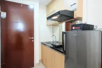Cozy Minimalist Studio @ Taman Melati Margonda Apartment by Travelio
