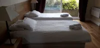 The Bear Inn and Burwash Motel Hotels near Teal