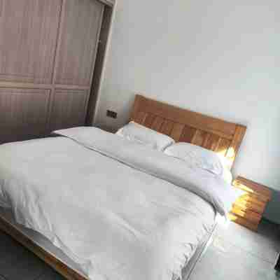 紅花小鎮公寓(當陽河路分店) Rooms