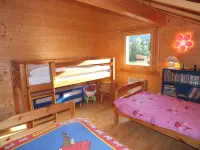 Charming chalet located on the edge of a lake with views of the ski slopes