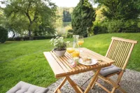 Modern vacation apartment directly on the Schloßsee, with its own terrace Hotels in Glucksburg