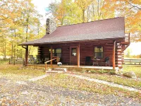 Beautiful log cabin with all the creature comforts of home. Private fishing lake