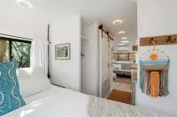 Renovated 1970’s retro camper on Bayou Grande in Pensacola with walking trail.