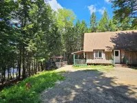 Spacious cabin on beautiful Long Lake w/waterfront view, private dock, fire pit.