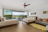 Modern Oceanfront Resort Living. 16' Ceilings. Luxury Oceanfront Bedroom Suites.
