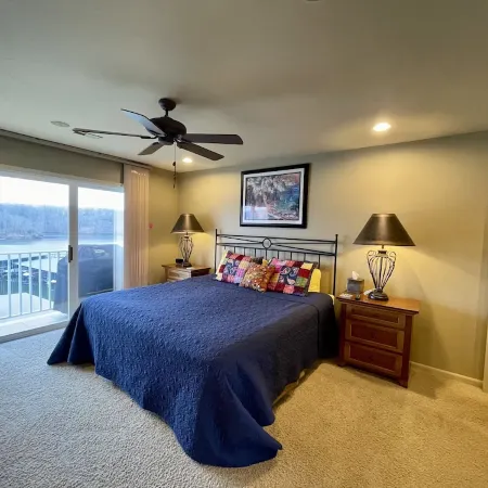 Beautiful lake front condo in perfect location by land and water. Boat Slip.