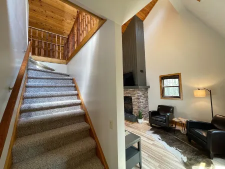 Cabin in the woods with hot tub and lake views. Pets welcome! Close to Nordic.