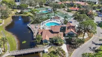 Sunshine 2-bedroom Shorewalk condo near beaches, IMG - Pickleball, Pool Lakeview