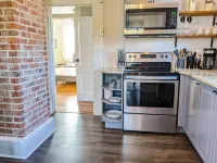 Spacious Living Area and Cozy Outdoor Space - Charming Industrial Retreat