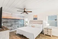 Stunning Ocean View and Pool Access - Charming Beachside Haven