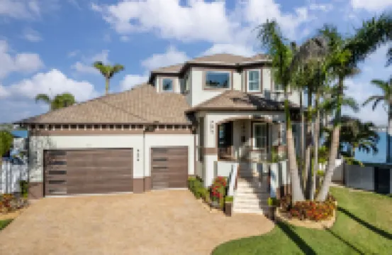 Gorgeous Waterfront Oasis with Heated Pool and Hot Tub - Elegant Retreat