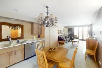 Ski-in/out condo with mountain views, pool, hot tub, sauna, gym & fireplace