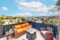 Breezy dog-friendly house with hot tub, central AC, game room, & washer/dryer