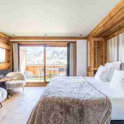 Les Peupliers | Hôtel 4 étoiles | Courchevel Le Praz Rooms