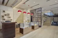 古爾岡巴尼廣場希爾頓逸林飯店