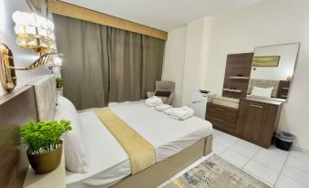 Gaddis Hotel, Suites and Apartments