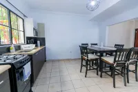 Friendly House Hotels in Ciudad Merliot