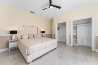 Luxurious 5-Bedroom Retreat: Gold Accents, Modern Amenities, & Fun