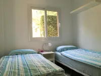 Modern garden apartment with a fantastic view of the sea and a private garden