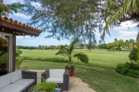 Prepare to be pampered! Golf, lagoon & ocean vista views  at Tres Palmas Villa!