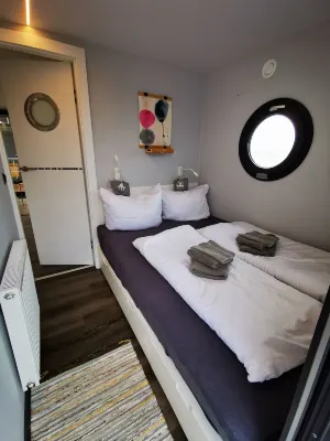 Houseboat Fjord Serina with bio-sauna and roof terrace in Schleswig