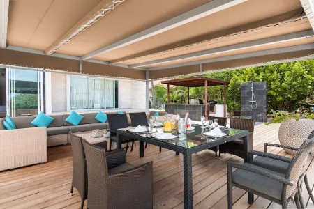 Stunning Beach Front Villa with Full Staff