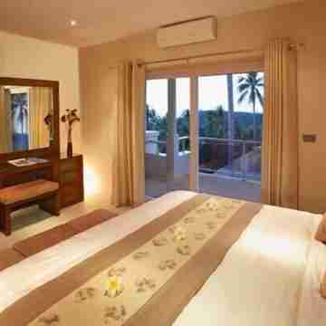 Luxurious semi - detached 2 bedroom Villa with 2 superb pools and sea views Rooms