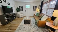 Chic Central Cottage- Wood Floors, Fireplace, Game Room & Firepit- Pet Friendly