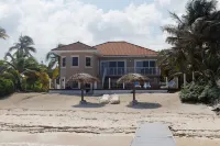 Coco Kai Beach Front Villa with Heated Pool and Private Dock