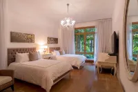 Chic luxury condo at Los Altos Casa de Campo Estadio Francisco A. Micheli附近的飯店