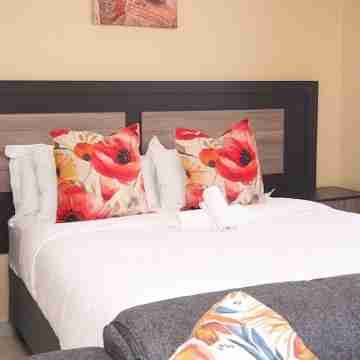 Amazing apartment with WiFi in vibrant Harare Rooms