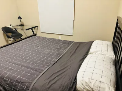 Main Floor 1 Bedroom Suite with Parking Hotels in Southwest Calgary