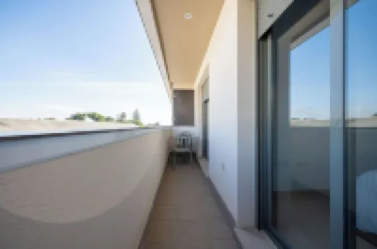 Centrally located with swimming pool and close to the train station