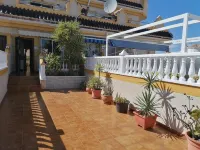 Spacious terraced house for up to six people with communal pool Hotels near Paddy's Point