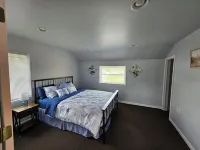 Fishermen and large groups will love this spacious building! Plenty of parking!